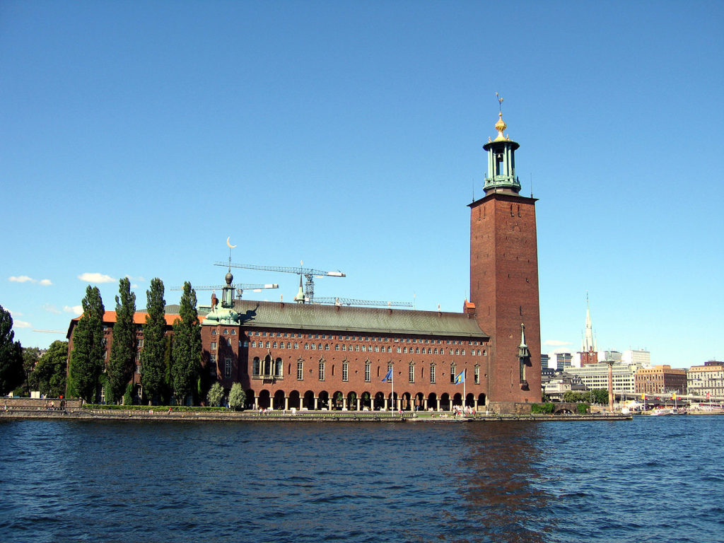 The exterior of Stockholm City Hall sits right next to the waters edge, and it can be seen from all over Stockholm. 
