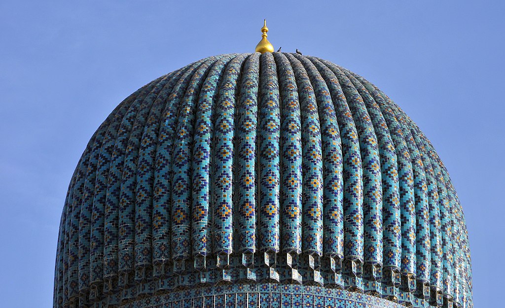 The dome of Timur's Mausoleum in Samarkand is covered with geometric patterns made from blue tiles. 
