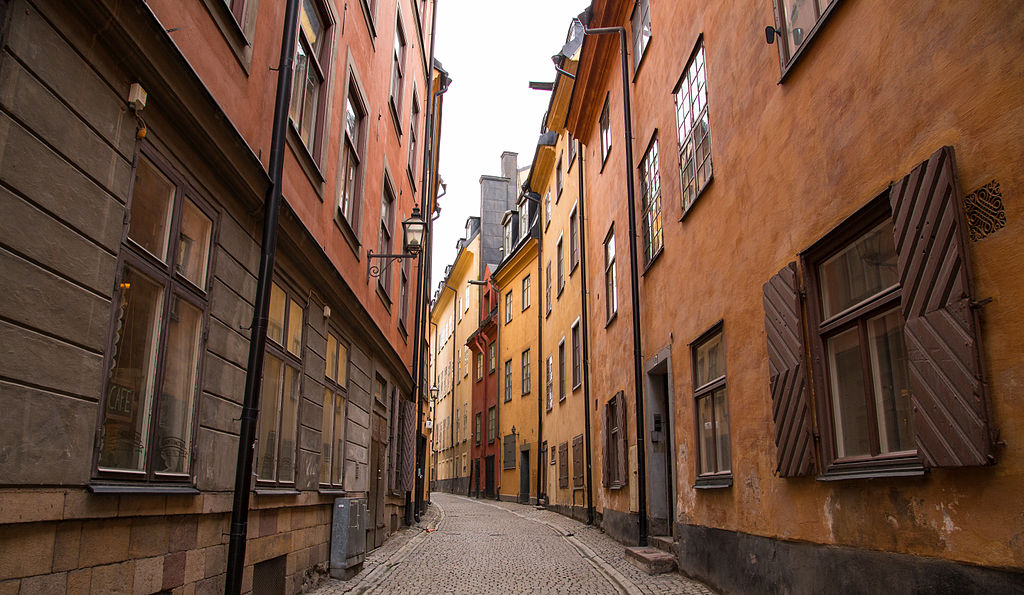 A typical street in the Gamla Stan is paved with cobble stones and is surrounded by buildings from the Medieval Period 