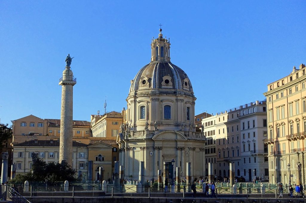 view of the Ancient Roman Column of Trajan located within Rome. Its an ancient Roman Victory Column commemorating Trajan's defeat of the Dacians. 