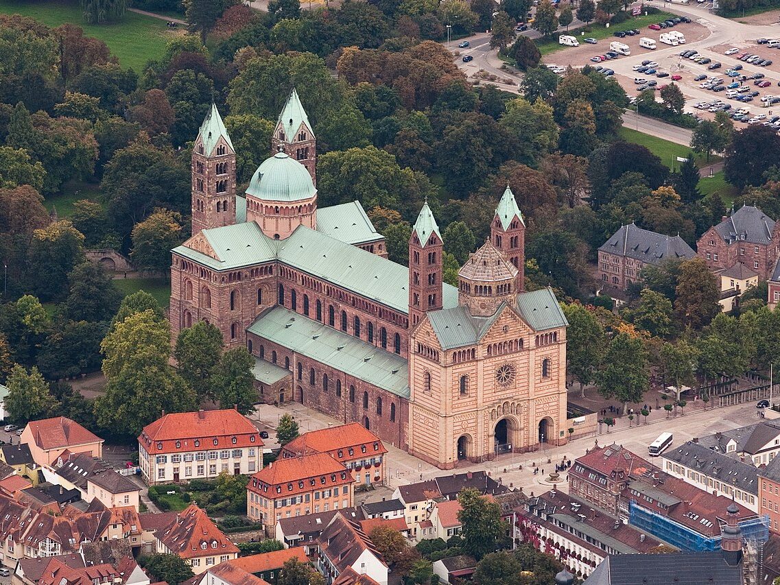 Speyer Cathedral is a  great example of a Romanesque Church with a Romanesque Revival Addition. 