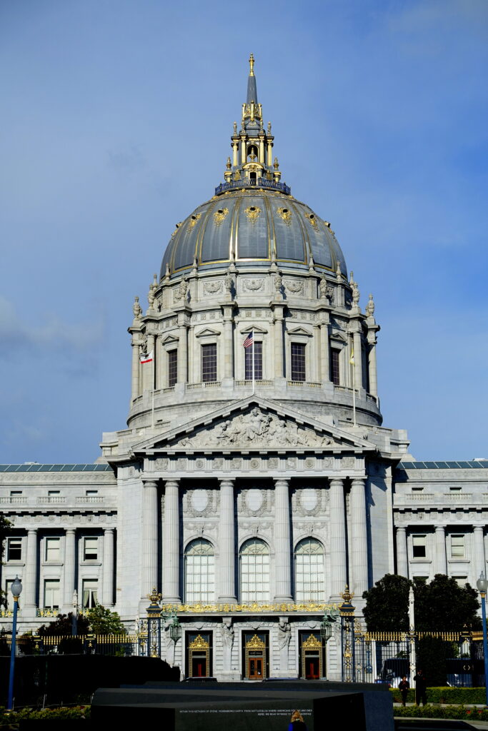 The dome atop San Francisco City Hall is a distinct element from Beaux Arts Architecture. 