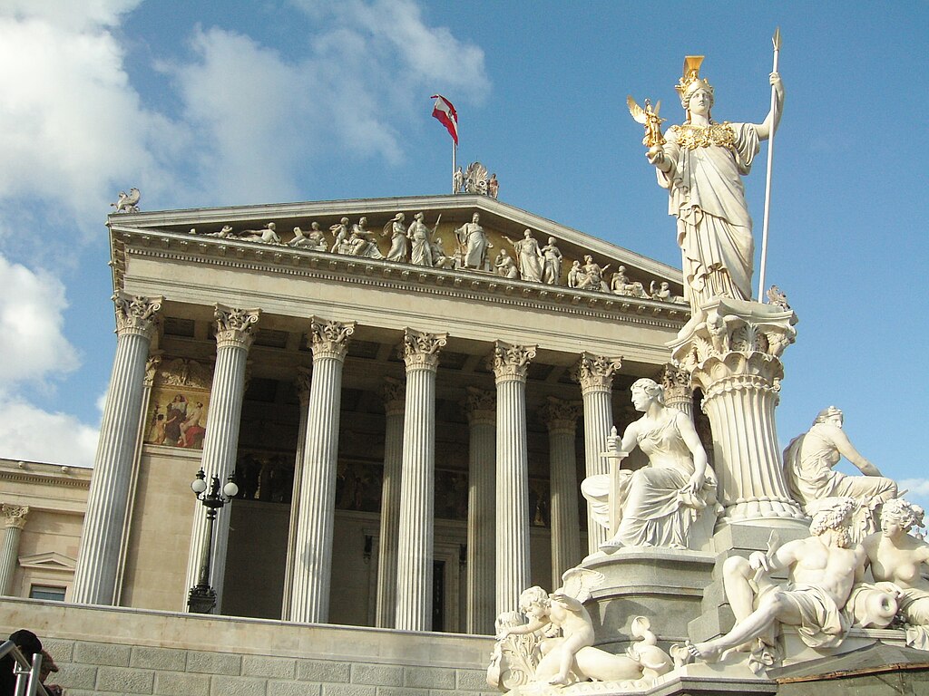 The Austrian Parliament Building is a Neoclassical structure within Vienna's Ringstrasse. 