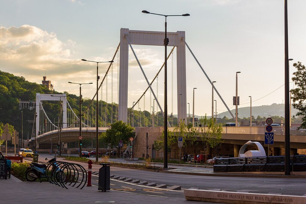Budapest contains many different bridges  that cross the Danube River. 