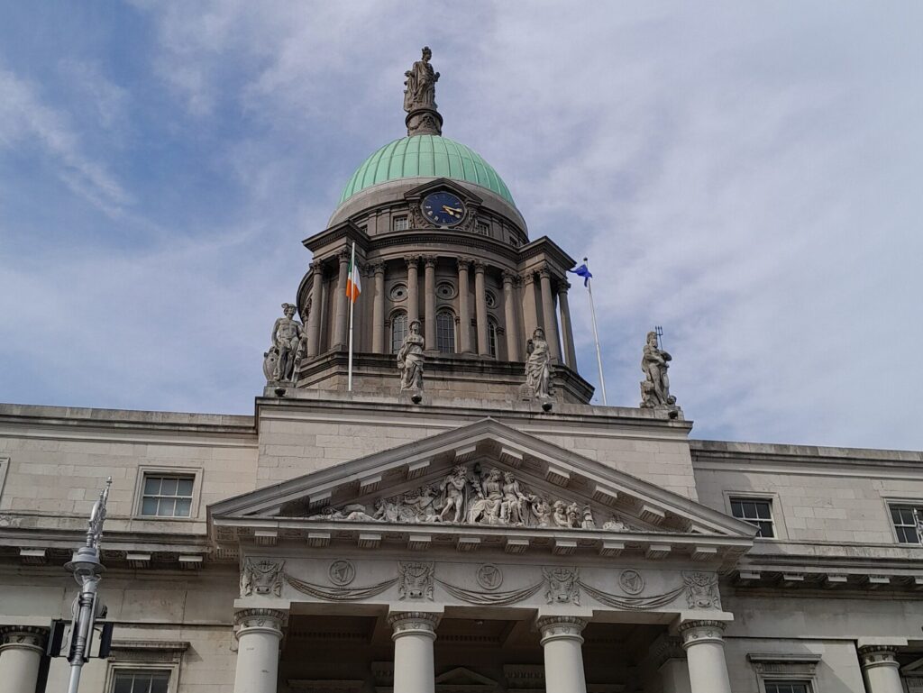 Dublin Custom House contains a large central dome, typically of the Neoclassical Period.
