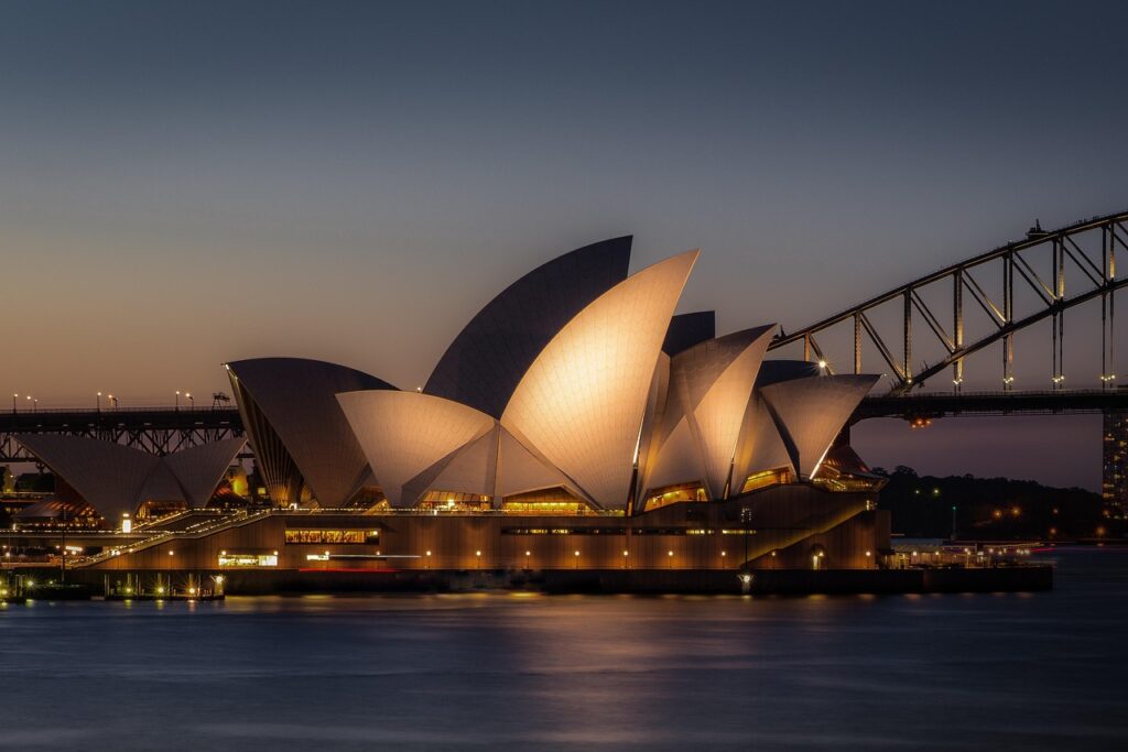 The Sydney Opera House is an impressive work of architecture overlooking Sydney Harbor. 